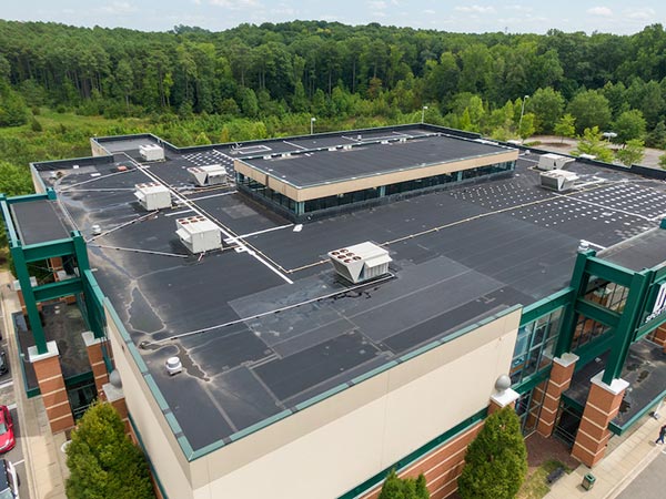 roof damage - Flat Roof Installation Evansville, IN